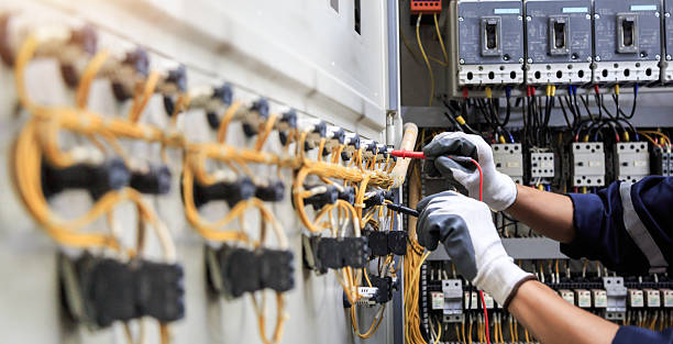 Professional Electrician technician working in Pike Creek, DE